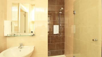 Shower, free toiletries, hair dryer, towels