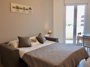 1 slaapkamer, een strijkplank/strijkijzer, wifi, beddengoed