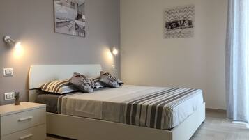 1 chambre, fer et planche Ă repasser, Wi-Fi, draps fournis