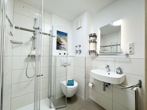 Douche, sèche-cheveux