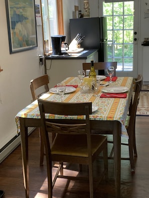 A comfortable dining table for meals or playing scrabble, cards or chess.