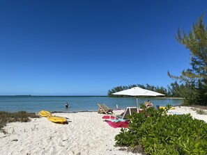 On the beach, sun-loungers, beach towels