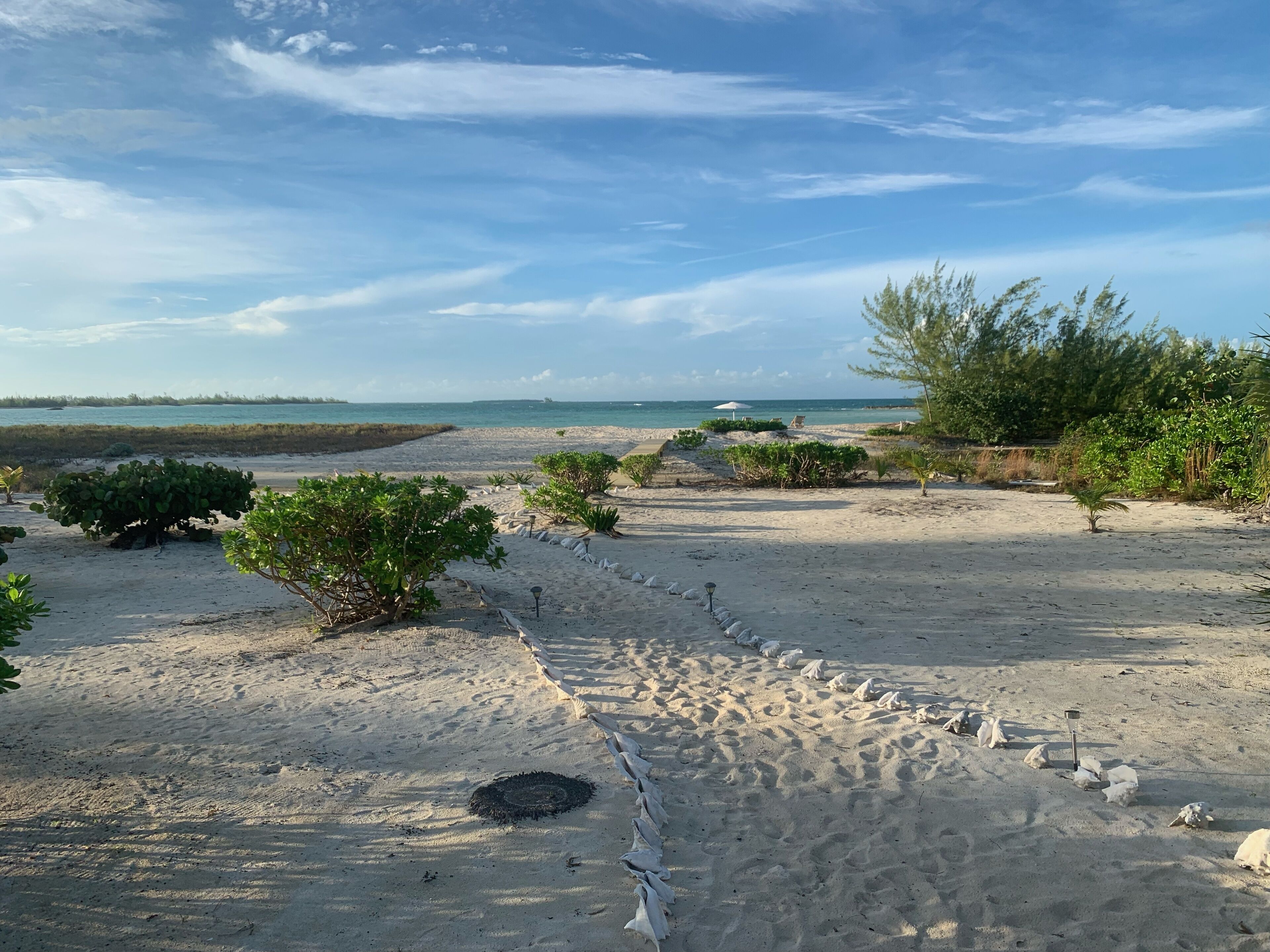 On the beach, sun loungers, beach towels