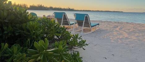 On the beach, sun loungers, beach towels