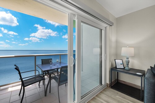 Beach Front View/access. Updated finishes and open floor plan.  