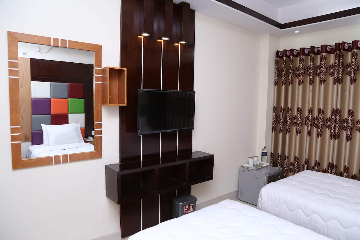 Down comforters, pillowtop beds, desk, soundproofing