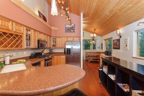 Fridge, microwave, oven, stovetop - Modern Townhome with stone fireplace, mountain views, deck & ski in/out (Girdwood)