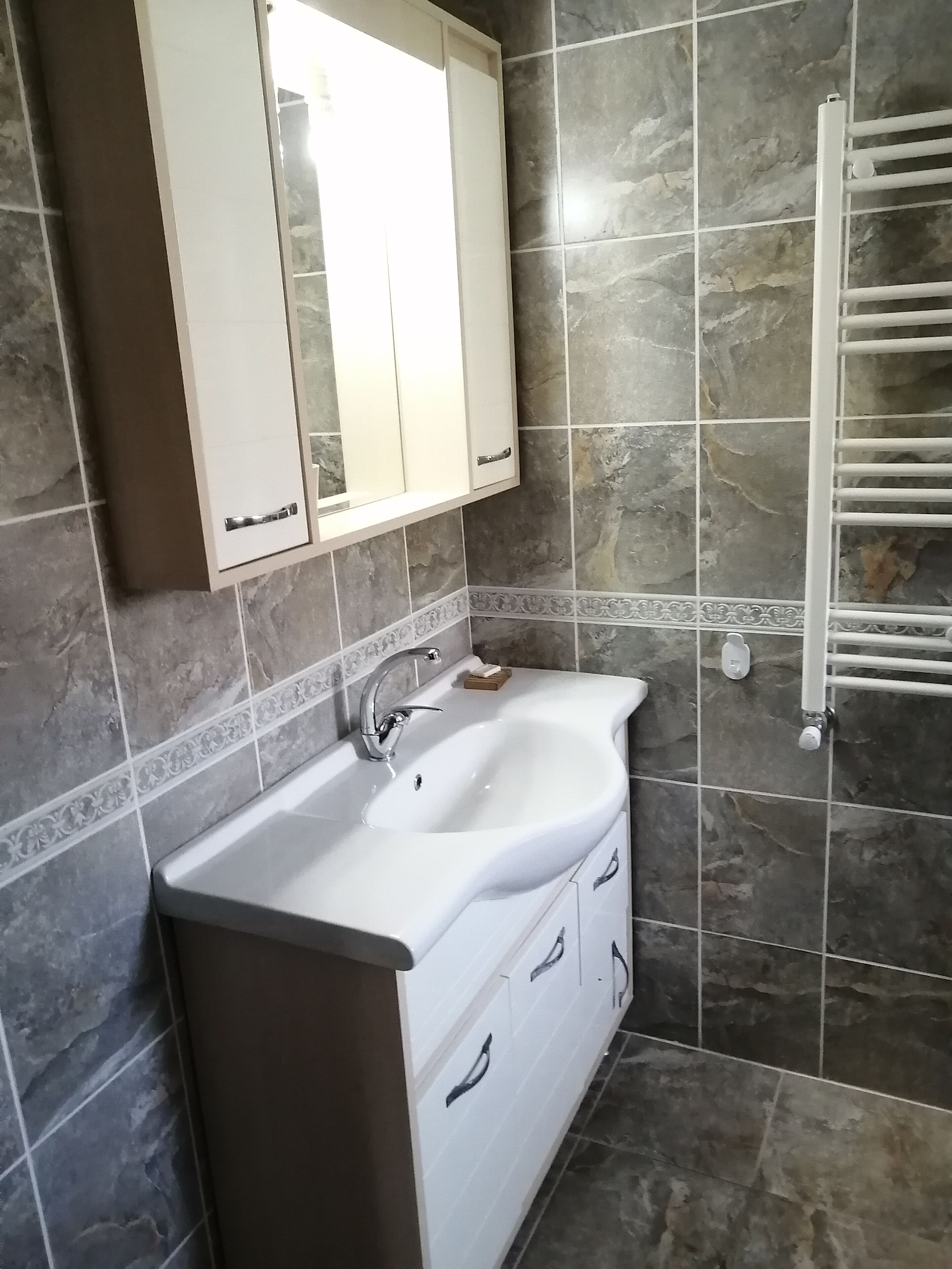 grand quadruple room | bathroom | shower, free toiletries, hair dryer, slippers