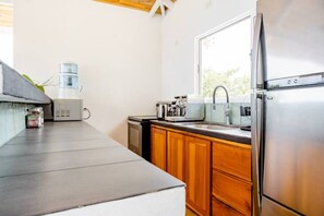 Shared kitchen - Lodge Las Estrellas de Samara (Sámara)