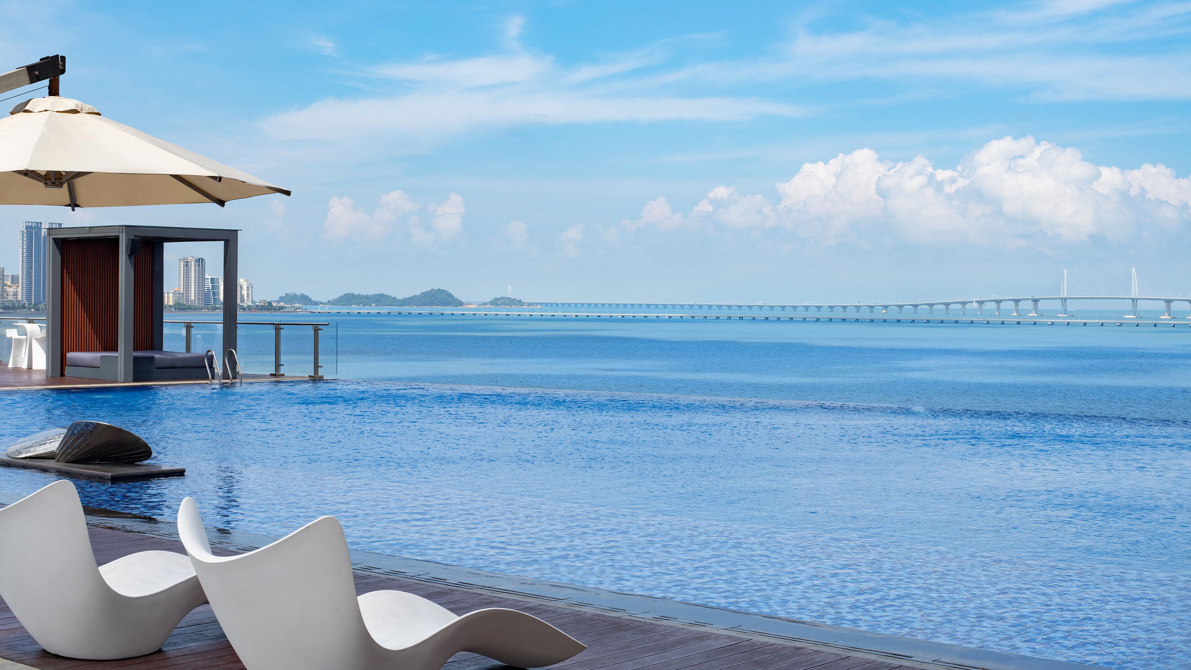 seasonal outdoor pool, open 7:00 am to 10:00 pm, pool loungers