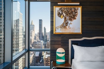 Room, 1 King Bed, City View, Corner | Premium bedding, down comforters, in-room safe, individually decorated at Renaissance New York Chelsea Hotel