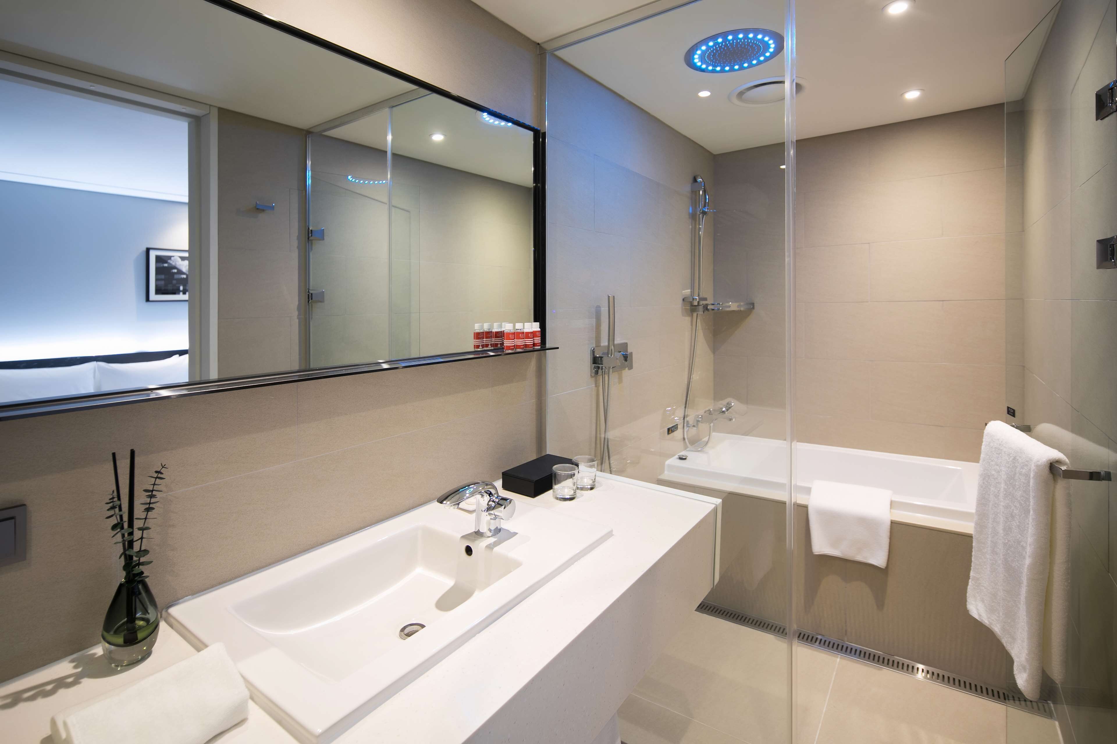 suite, 2 double beds, non smoking | bathroom | hair dryer, bathrobes, slippers, bidet