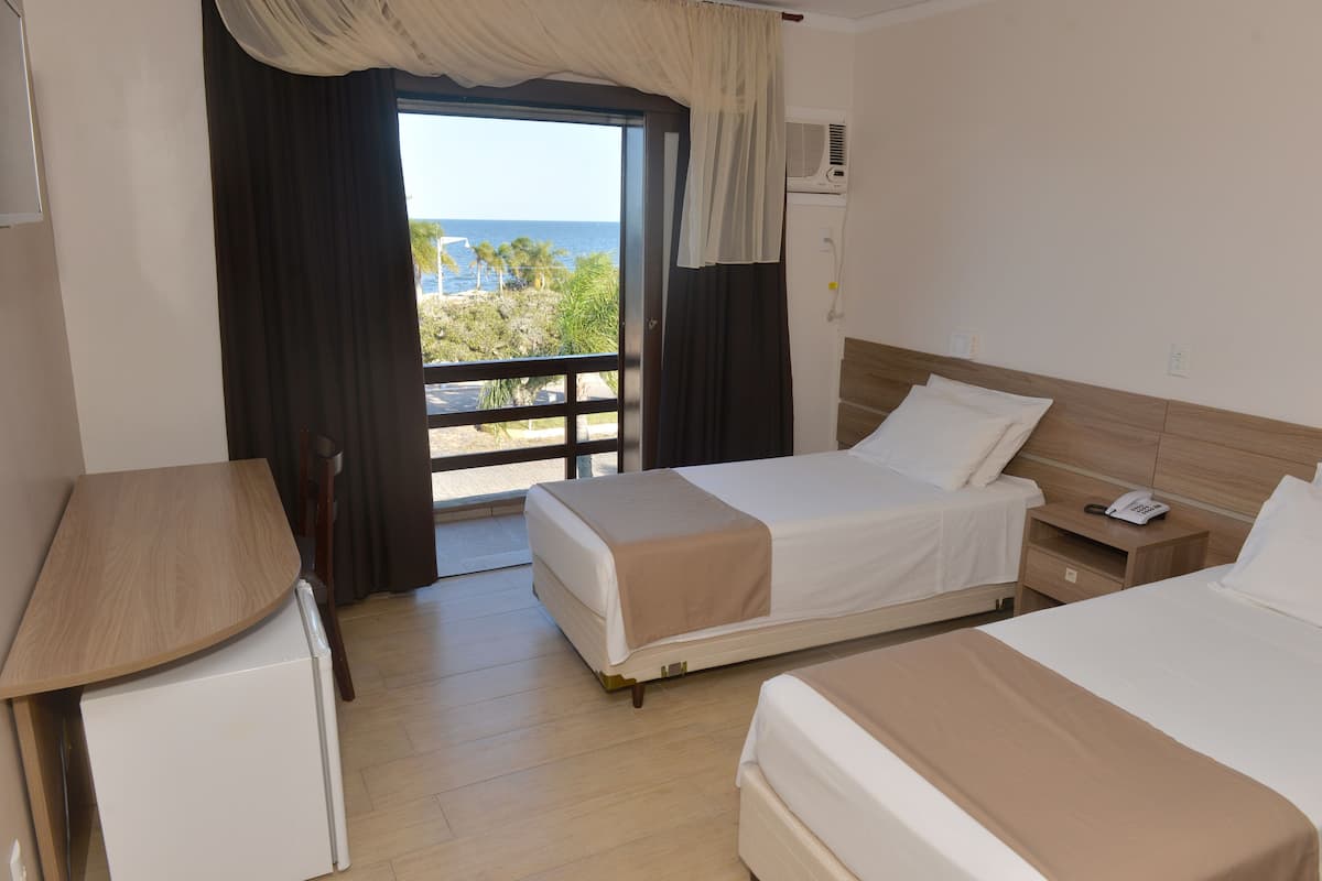 luxury double or twin room, lake view | minibar, desk, free wifi, bed sheets