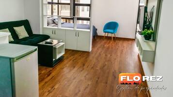 Standard Apartment, 1 Bedroom, Accessible, Private Bathroom | Living area | 32-inch flat-screen TV with digital channels, TV, first-run films