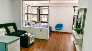 Standard Apartment, 1 Bedroom, Accessible, Private Bathroom | Living area | 32-inch flat-screen TV with digital channels, TV, first-run movies - Florez Apartments (La Paz)