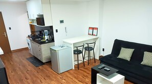 Standard Apartment, 1 Bedroom, Accessible, Private Bathroom | Living area | 32-inch flat-screen TV with digital channels, TV, first-run movies - Florez Apartments (La Paz)