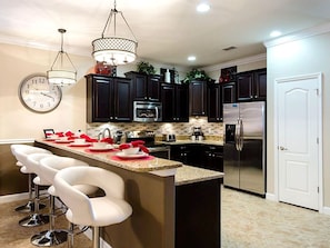 House, Multiple Beds | Private kitchen