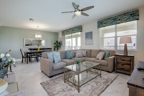 Villa, varias camas | Zona de estar