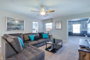 Villa, varias camas | Zona de estar