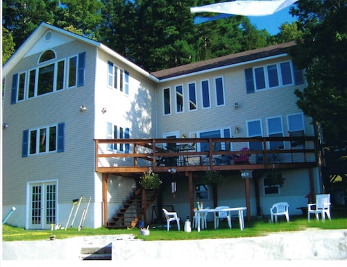 Beautiful Waterfront Home with stuning views Across from Roger's Rock