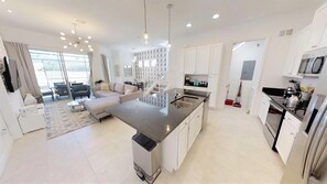 Townhome, 5 Bedrooms | Private kitchen | Microwave, oven, stovetop, dishwasher