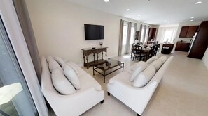 Casa, varias camas | Área de sala de estar