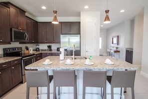 House, Multiple Beds | Private kitchen