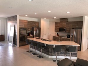 House, Multiple Beds | Private kitchen