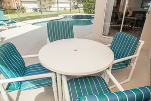 Outdoor dining - Rolling Hills Four-bedroom (Kissimmee)