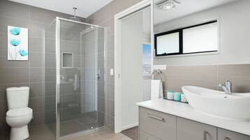 Bathtub, hair dryer, towels, soap
