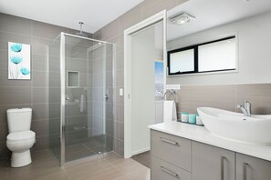 Bathtub, hair dryer, towels, soap