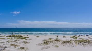 On the beach, sun loungers, beach towels