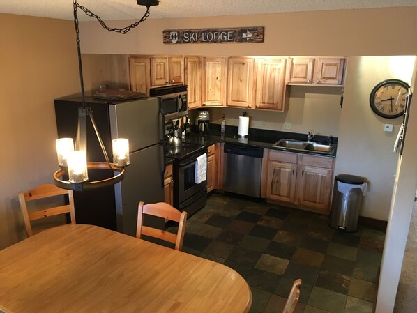 Coffee/tea maker, fridge, microwave, oven