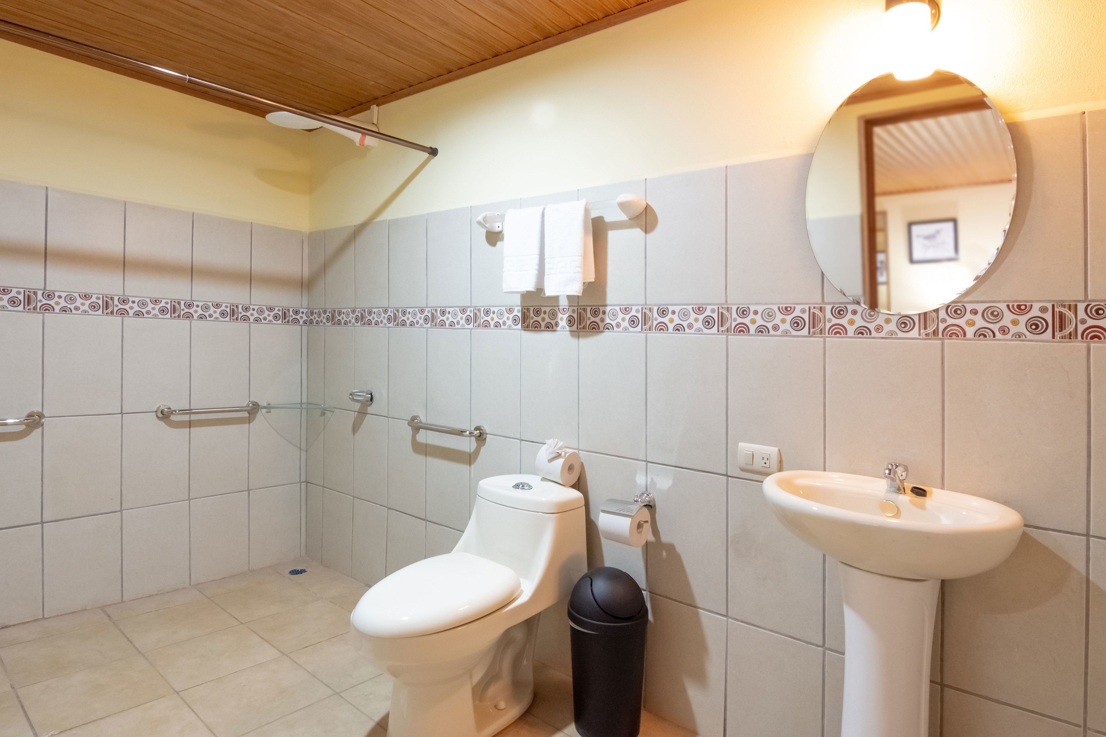 budget twin room, 2 twin beds, accessible, non smoking | bathroom | shower, free toiletries, hair dryer, towels