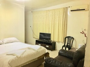 Chambre quadruple Deluxe, vue sur la montagne | 1 chambre, draps en coton égyptien, literie de qualité, coffre-fort