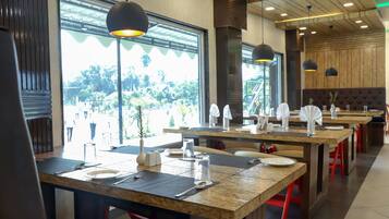 Breakfast, lunch, dinner served; local and international cuisine