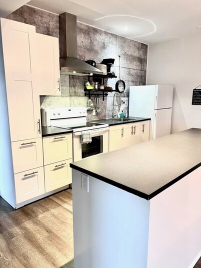 SUTTON - CONDO IN THE HEART OF THE VILLAGE
