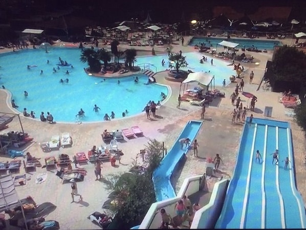 Indoor pool, 4 outdoor pools, open 10:00 AM to 6:00 PM, pool umbrellas