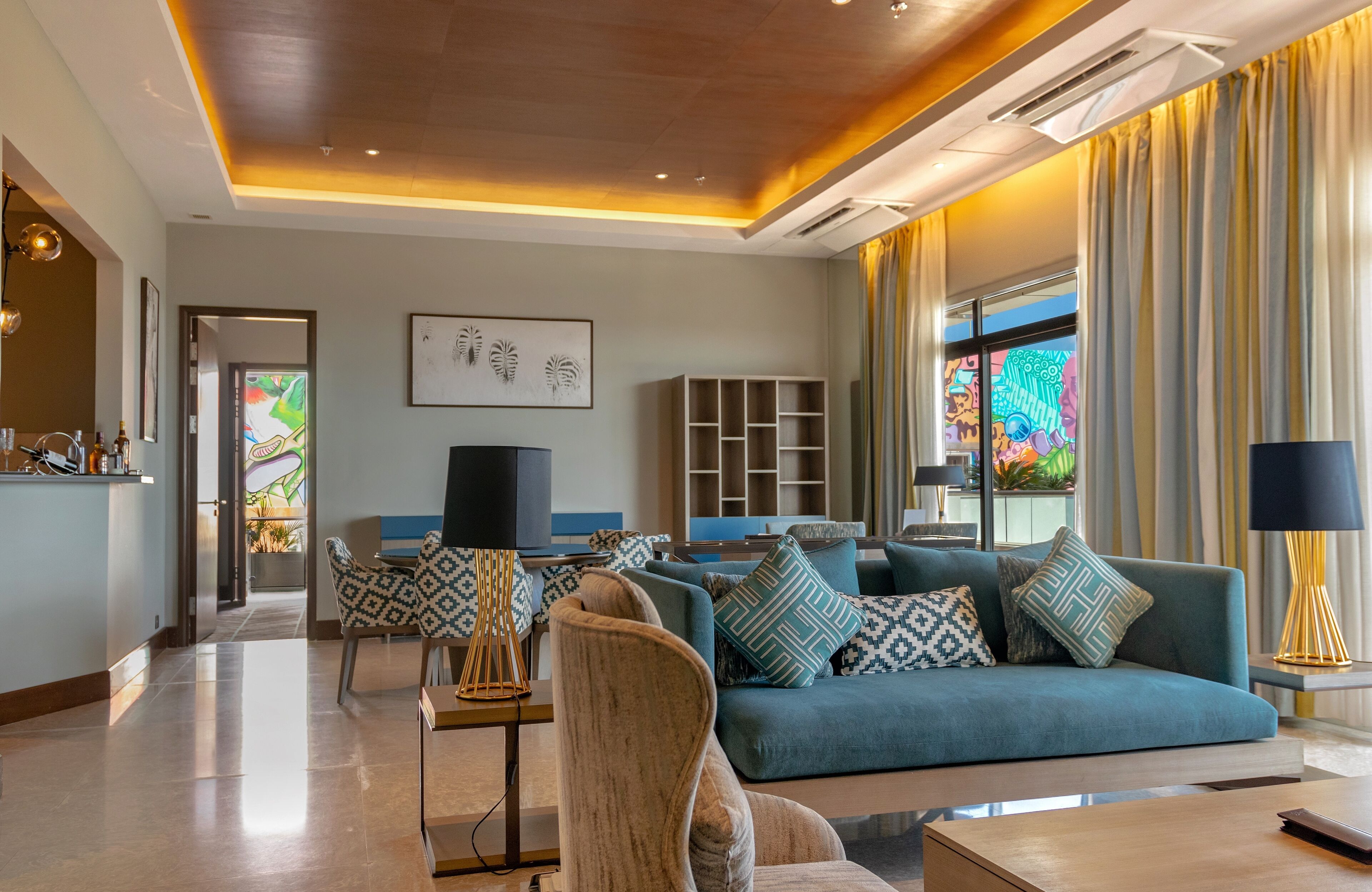 Premium Suite, Multiple Beds, Kitchenette | Living area | 45-inch LED TV with satellite channels, TV