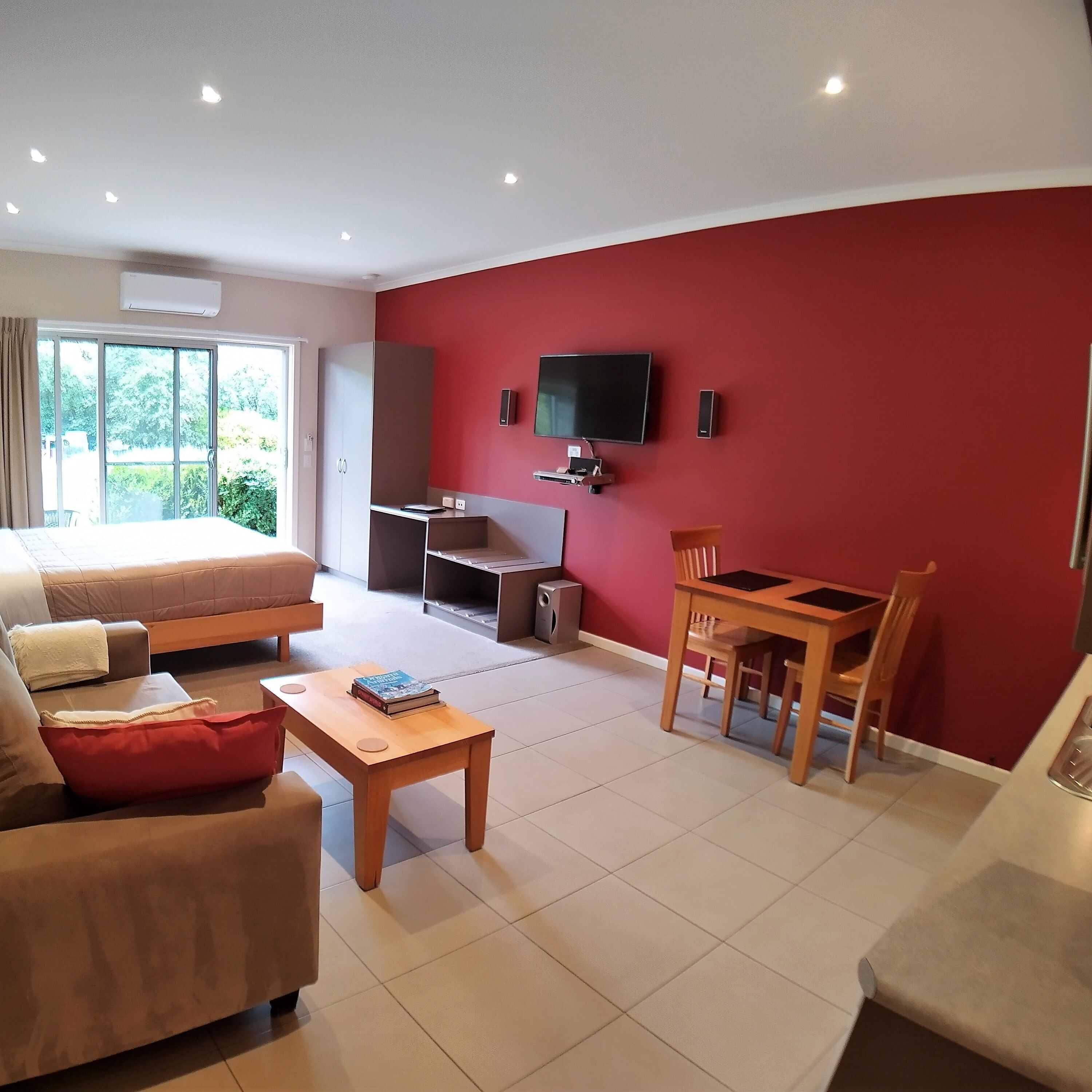 luxury studio, 1 queen bed, accessible, non smoking | living area | tv