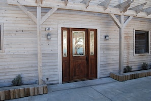 Elegant front door with stained glass Dolphins to greet you