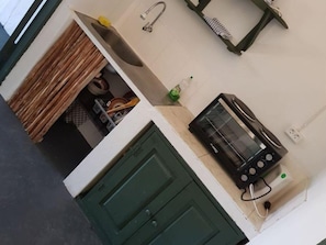 Full-size fridge, microwave, stovetop, electric kettle