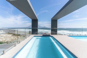 Outdoor pool, open 9:00 AM to 6:00 PM, pool umbrellas, pool loungers - Blaauwberg Beach Hotel (Cape Town)