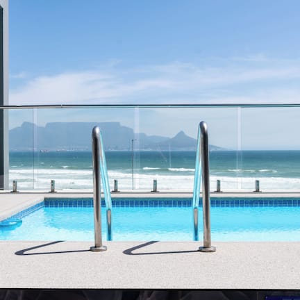 Outdoor pool, open 9:00 AM to 6:00 PM, pool umbrellas, sun loungers