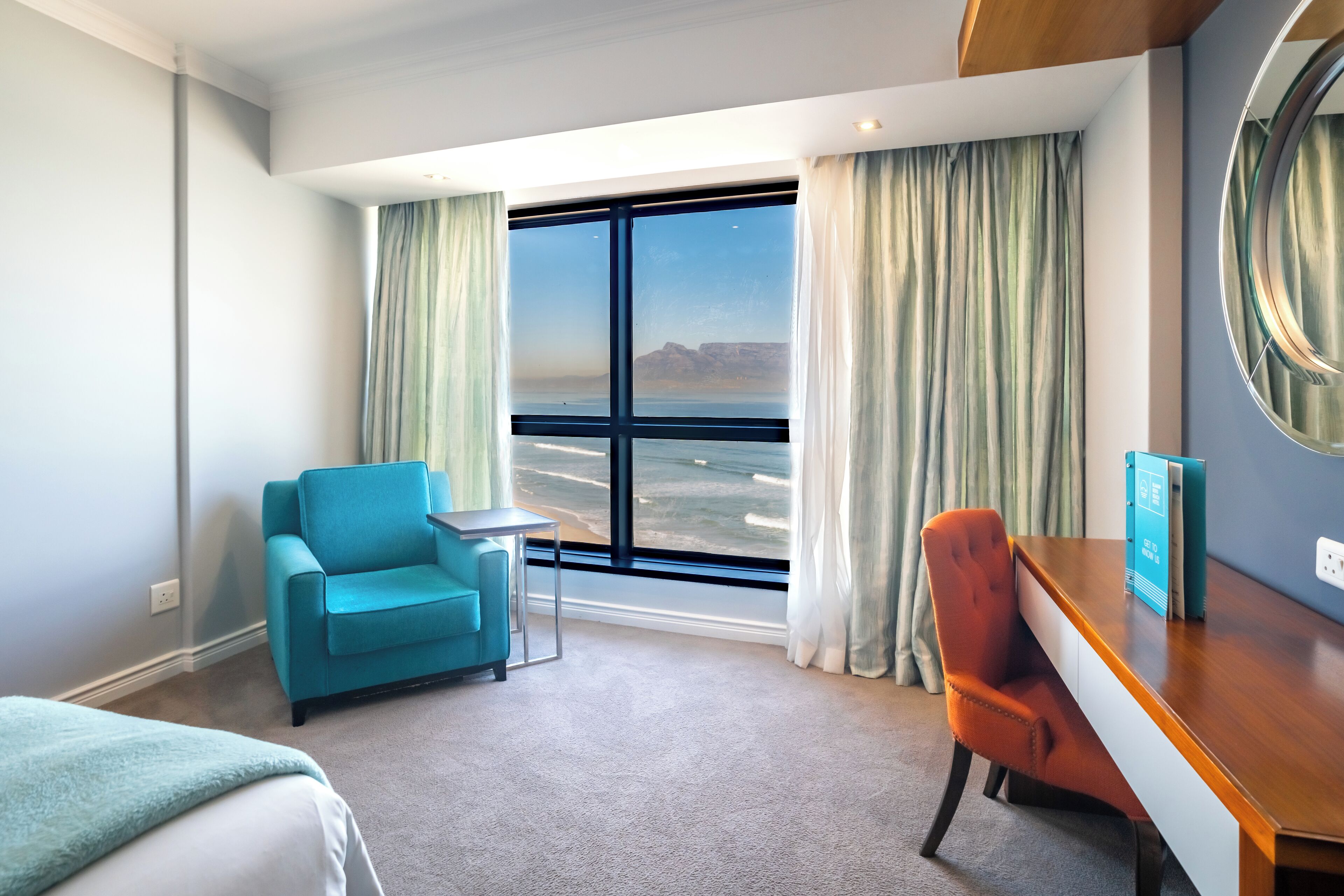 sea facing table mountain twin room | premium bedding, minibar, in-room safe, individually decorated