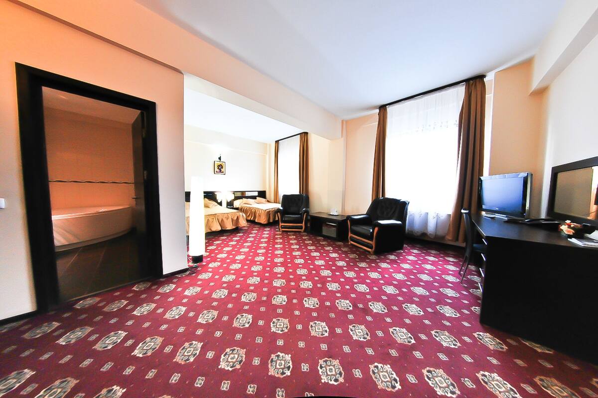 Habitación Confort con 1 cama matrimonial o 2 individuales | Minibar, insonorización y wifi gratis