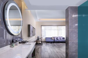 Premium bedding, memory foam beds, free minibar, desk