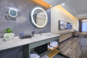 Premium bedding, memory foam beds, free minibar, desk