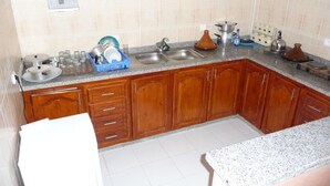 Fridge, stovetop, cookware/dishes/utensils