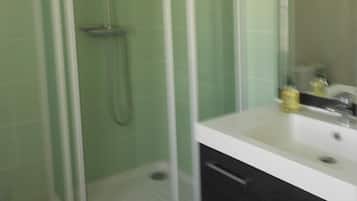 Shower, free toiletries, hair dryer, towels
